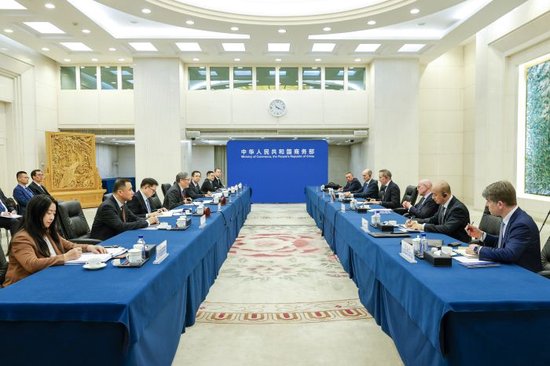 商务部部长王文涛会见大众汽车集团管理董事会主席奥博穆  第2张